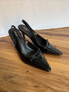 Cider Black Patent Pointed Slingback Pumps with Bow Accent